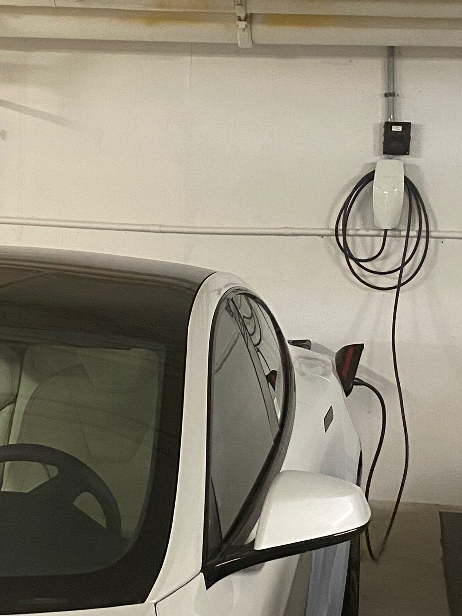 Tesla charger installation apartments garage top best certified official Tesla installer Palm Coast St. Augustine New Smyrna Beach Daytona Beach